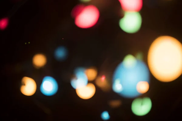 Schöne Bunte Bokeh Weihnachtsbeleuchtung Auf Schwarzem Hintergrund — Stockfoto