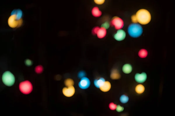 Schöne Bunte Bokeh Weihnachtsbeleuchtung Auf Schwarzem Hintergrund — Stockfoto