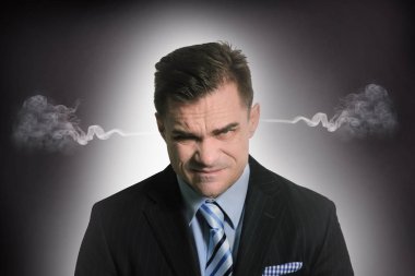 Başarılı ve yakışıklı bir işadamı. İş kavramı.