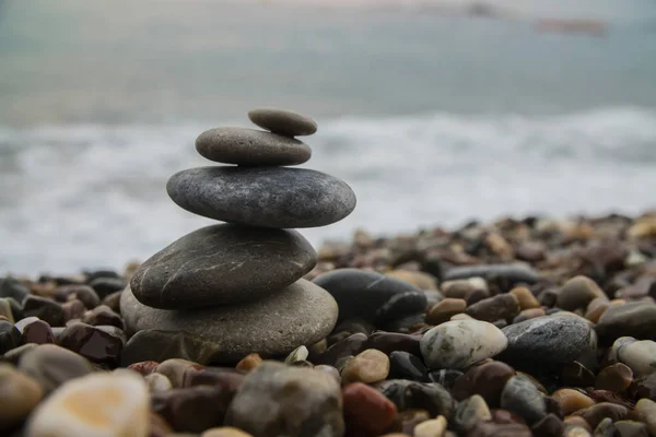 Pile of stones on seaside background