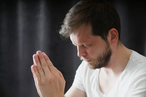 stock image man praying close up portrait  