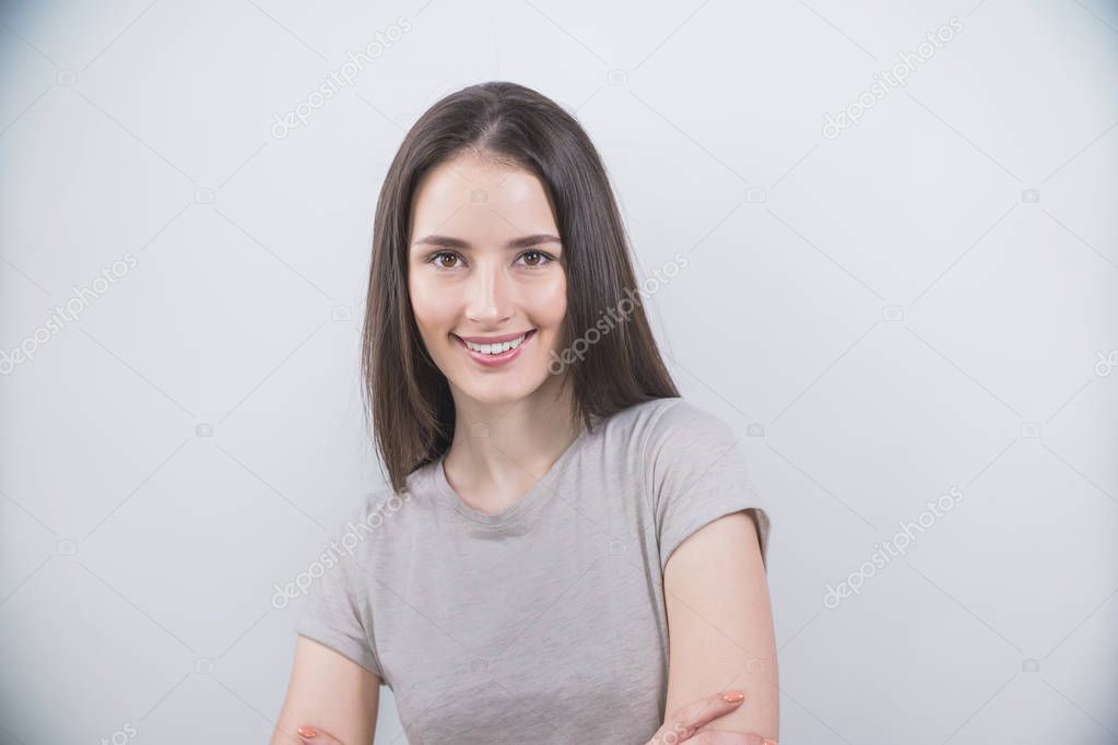 Smiling Female Business Leader over gray background