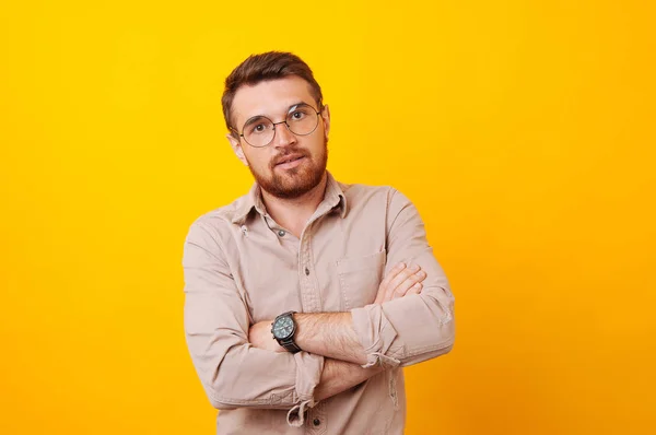 Portrait of man with crossed arms