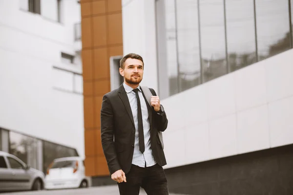 Photo of motivated business man walking to future