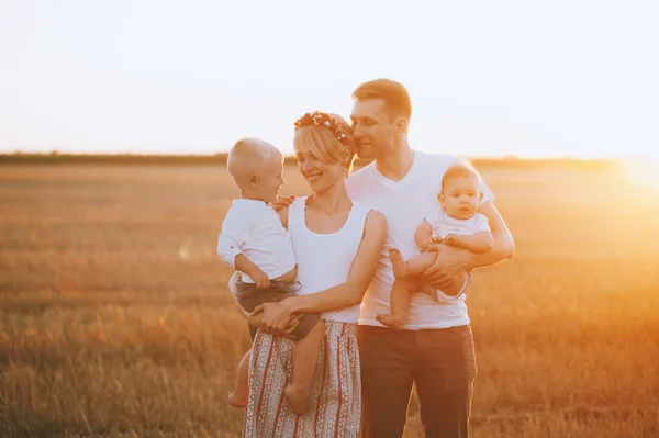 Happy Young Family Holding Children Hands Nature Field Sunset — Stock Photo, Image