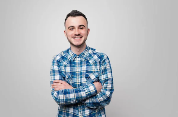 Feliz Chico Joven Con Camisa Cuadros Azul Está Cruzando Las — Foto de Stock