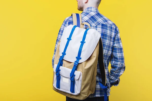 Handsome Guy Blue Checkerd Shirt Colorful Backpack Yellow Background — Stock Photo, Image