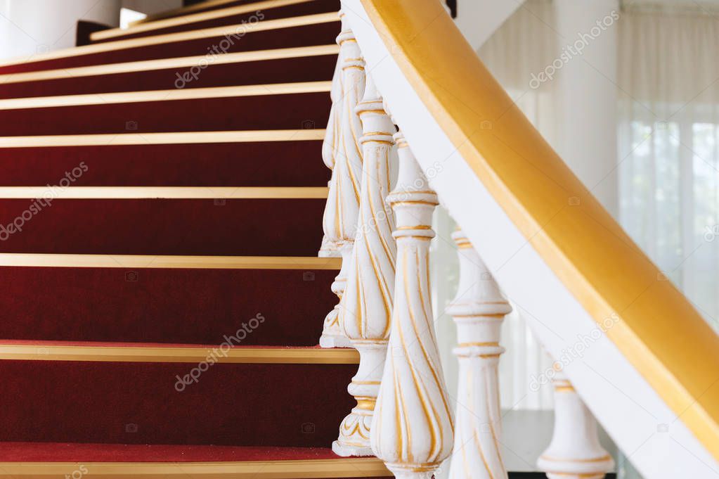 Photo of wooden antique stairs, in handsome house or museum