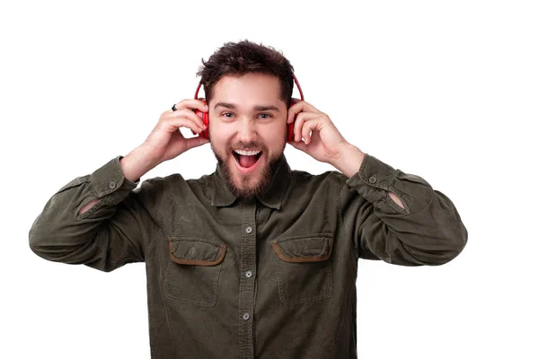 Joven Emocionado Escuchando Música Favorita Los Auriculares Fondo Blanco Aislado — Foto de Stock