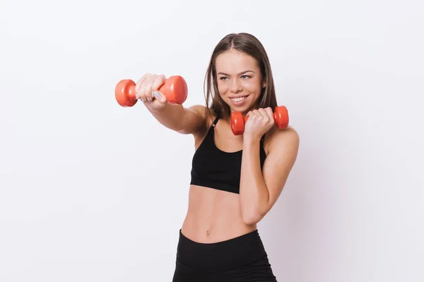 Portrait of young fitness woman workout with weights — Stock Photo, Image