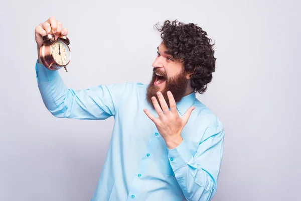 Portrait of man looking afraid at Alarm Clock, I late, time management concept — Stock Photo, Image