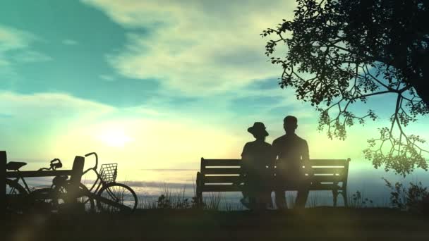 Couple sur un banc regardant l'océan — Video