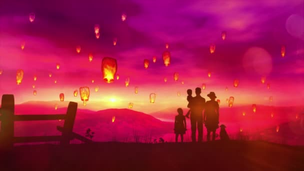 De familie lanceert een Chinese lantaarn bij zonsondergang — Stockvideo