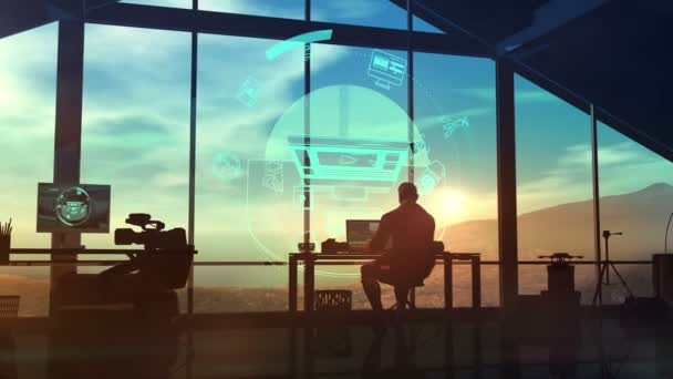 The silhouette of a videographer at a workplace in his office. — Stock Video