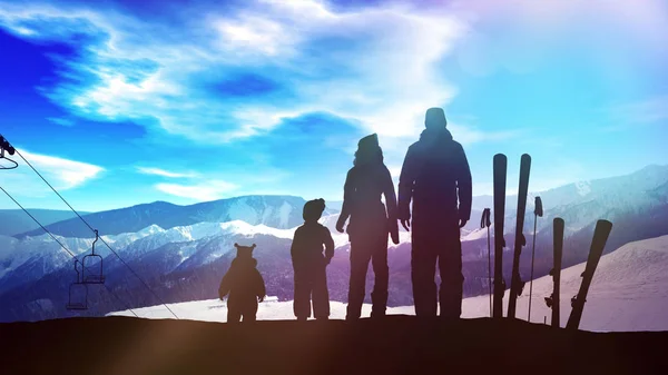 Family with children on a ski slope. — Stock Photo, Image