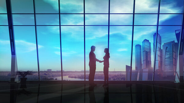 Handshake of business people at the end of the working day against the background of panoramic windows overlooking skyscrapers.
