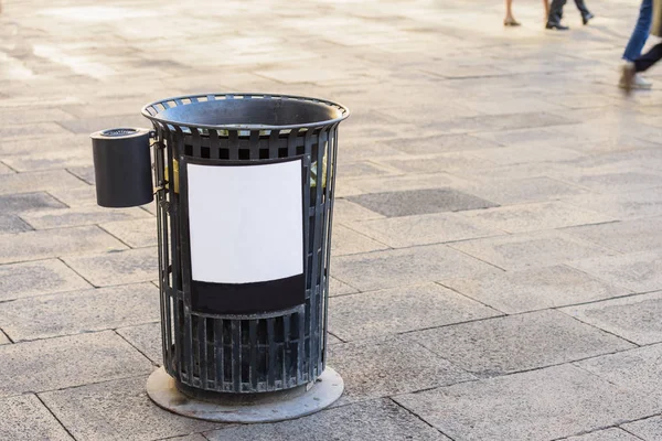 Empty trash bin with an advertising space