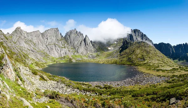 Mountains under the name Dusse Alin in Russian Far East Khabarovsk region. Beautiful Mountain Lake is called the Bear in the mountains Dusse Alin. 