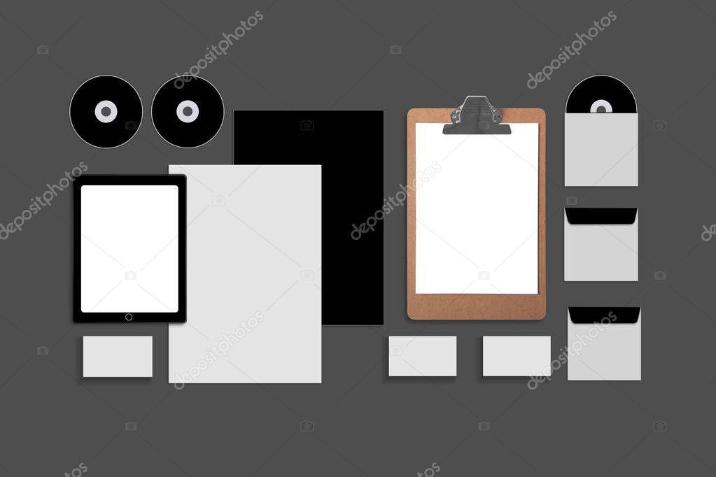Blank Corporate ID. Set on gray background. Consist of business cards, folder, tablet PC, envelopes, a4 letterheads, notebooks, flash, pencil, cd disk and smart phones.