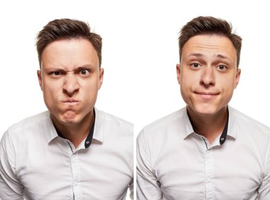 Beyaz arka plan üzerinde izole beyaz gömlek giymiş genç adam etkileyici bir yüz