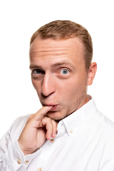 Handsome young blond man in a white shirt, isolated on a white background — Stock Photo, Image