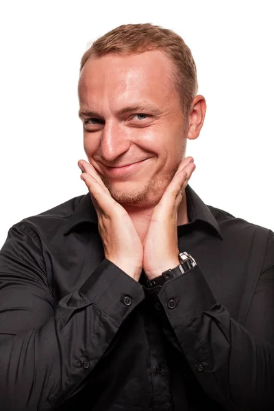 Knappe jonge blonde man in een zwart shirt, geïsoleerd op een witte achtergrond — Stockfoto