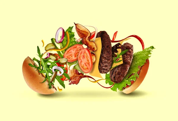 Burger with flying ingredients against beige background. Ham, beef cutlet, cheese, sauces, vegetables and greens. Close up, copy space — Stock Photo, Image