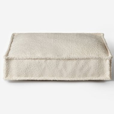 Sıcak ve davetkar evcil hayvan yatağı tüylü arkadaşlara rahatlık ve rahatlık sağlıyor.