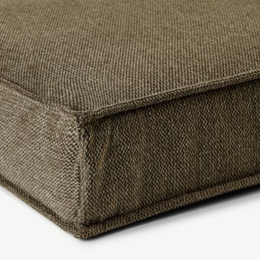 Dikiş ve kumaş dokusunu vurgulayan döşenmiş mobilya parçasının ayrıntıları