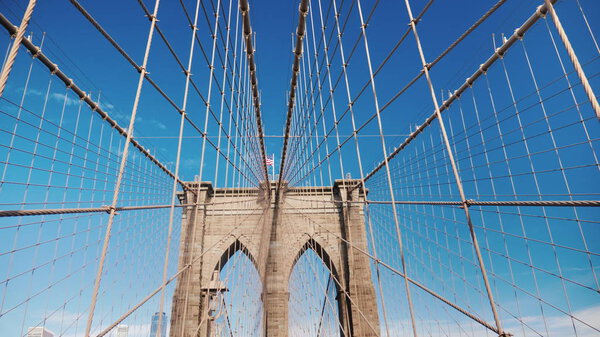 Walk along the Brooklyn Bridge towards Manhattan. One of the most popular tourist places. Steadicam shot