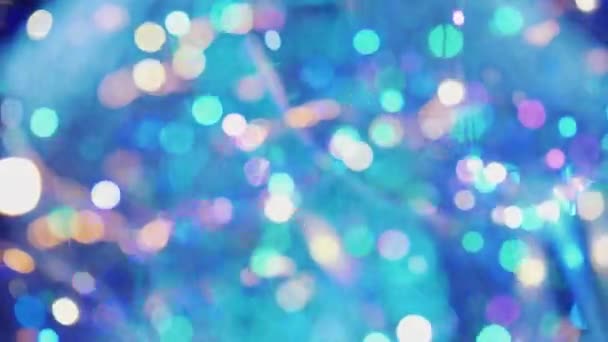 Contexte de ballons transparents sur lesquels clignote la guirlande festive 