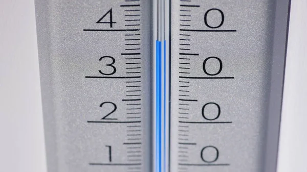 Thermometer in hot weather. Extreme heat and hot summer concept