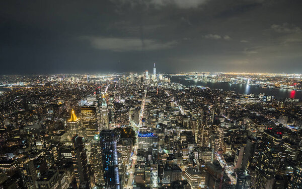 Twilight of Manhattan, New York. Aerial view with dramatic sky