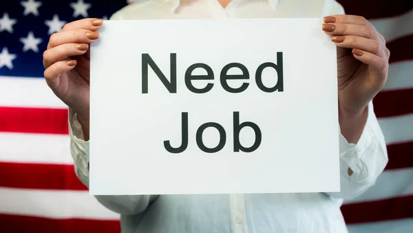 Woman holding a poster Need Job. Employment in the USA — Stock Photo, Image