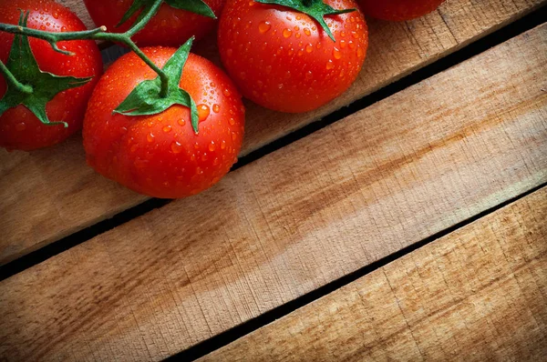 Fresh Tomatoes Lie Textured Wooden Board — Stock Photo, Image