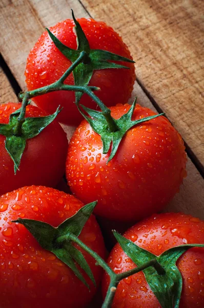 Fresh Tomatoes Lie Textured Wooden Board — Stock Photo, Image