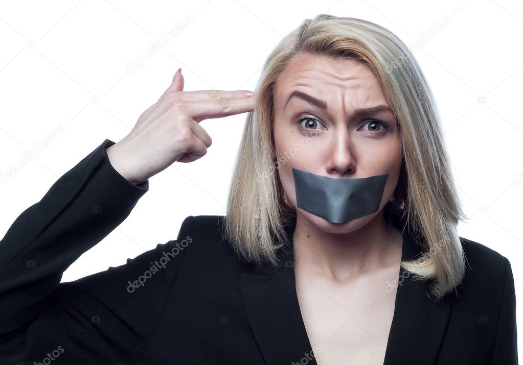 Girl with a mouth taped on a white backgroun