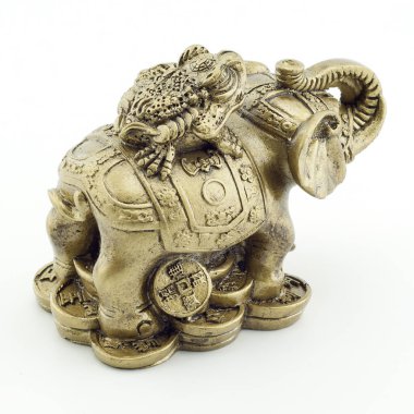 Bronz fil ve bir beyaz adam bir kurbağaya