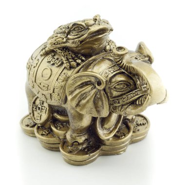 Bronz fil ve bir beyaz adam bir kurbağaya