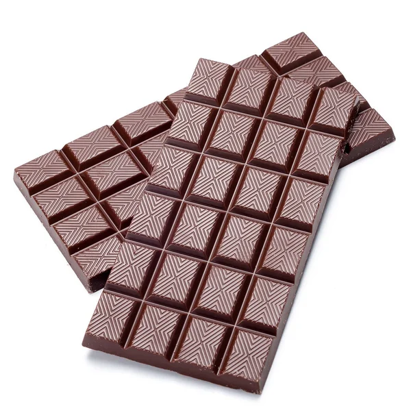 Tmavá čokoládová tyčinka na bílém pozadí — Stock fotografie