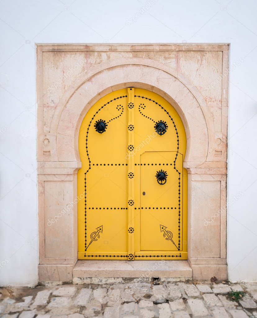 Old, elegant entrance to the house. Tunisian door