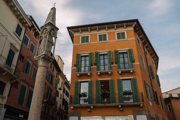 Verona, Italy - August 12, 2016: Buildings at Piazza Bra of Verona, Italy.