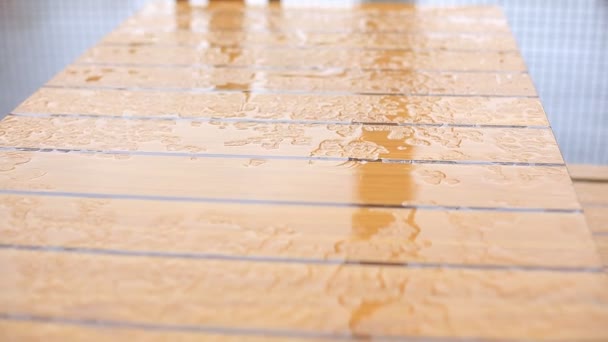 Wet table closeup outside restaurant during heavy rain — Stock Footage Wet Table Closeup Restaurant Heavy Rain Royalty Free Stock Video