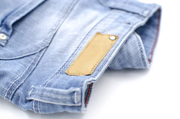 Modré Džíny Bílé Pozadí Oblečení Móda Charita — Stock fotografie