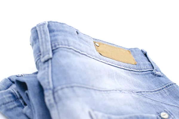 Blå Jeans Vit Bakgrund Kläder Mode Välgörenhet — Stockfoto