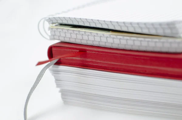 Stack of notebooks is on a white background