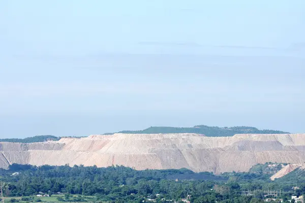 Debris/overburden hillocks formed in the process of removal of coal