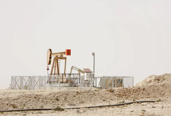 A beautiful nodding Donkey oil pumps in Bahrain oil field