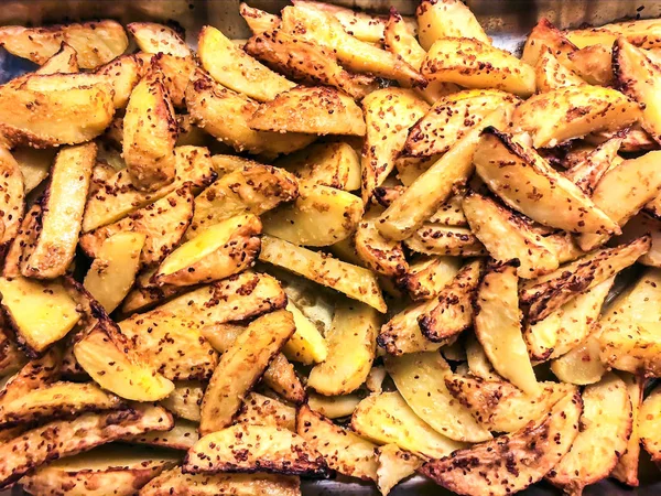 Potato slices baked with spices