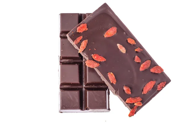 Black bitter chocolate with goji berries — Stock Photo, Image